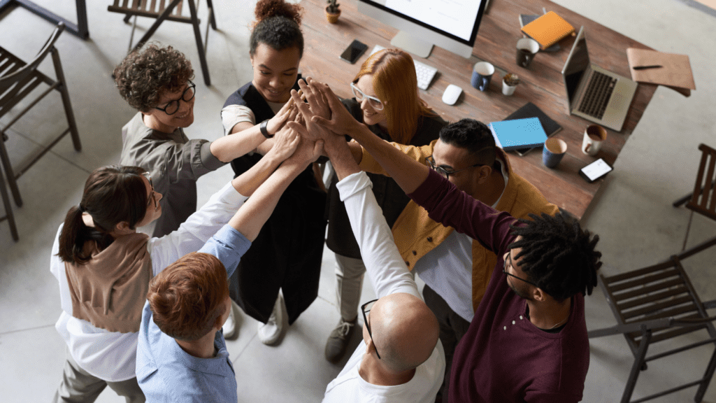 A group of diverse professionals celebrating success.