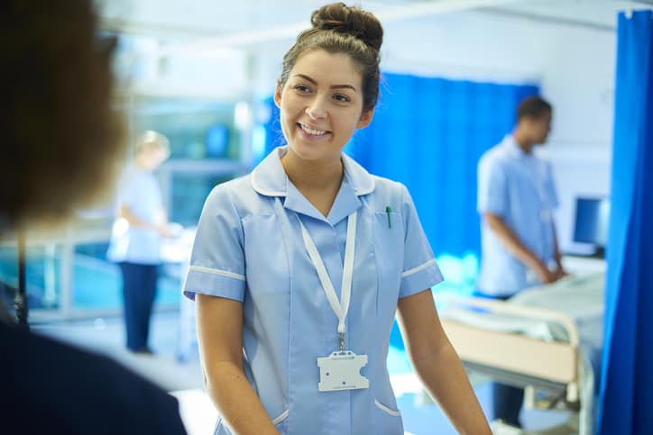 young NHS nurse on the ward